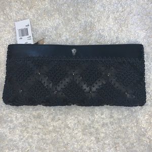 brand new clutch, comes with a strap